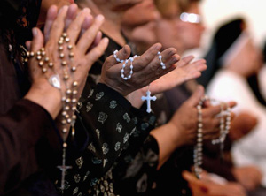 Catholics use Rosaries as a Tool for Worship. Often used as Necklace, bracelet and seen on their wallerts